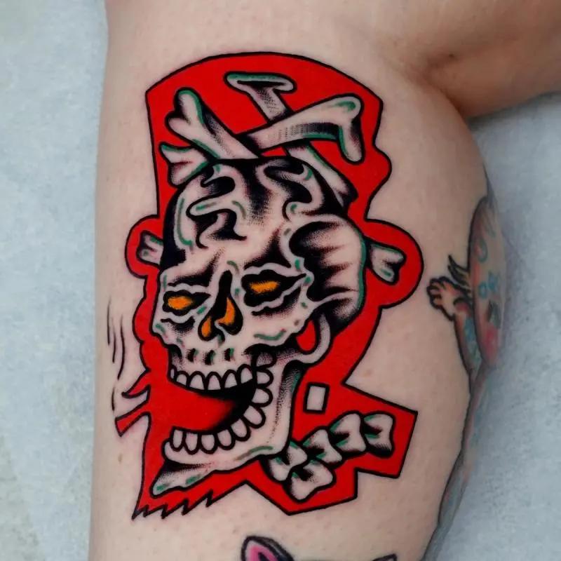 a skull with red background tattoo