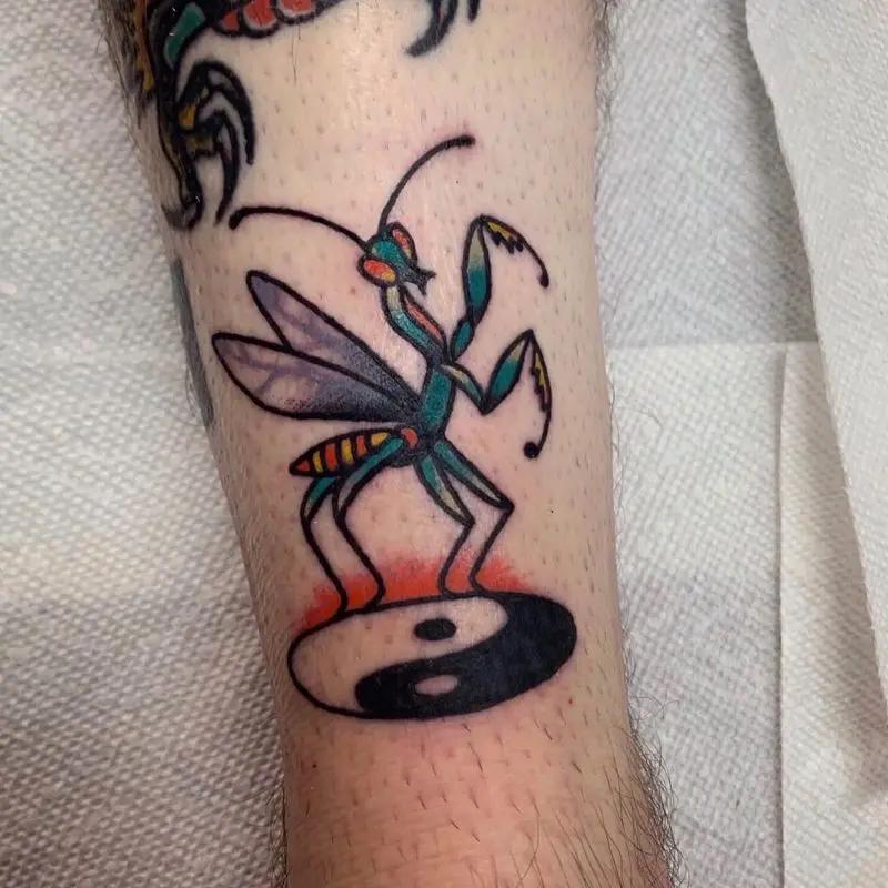 a grasshopper tattoo