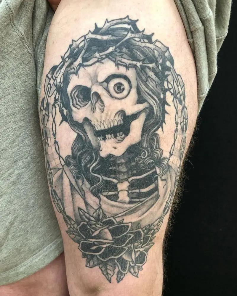 a skull tattoo at the arm