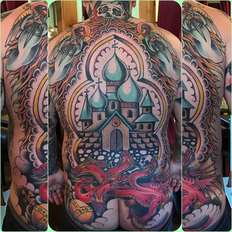 a tattoo of a palace in a person's back