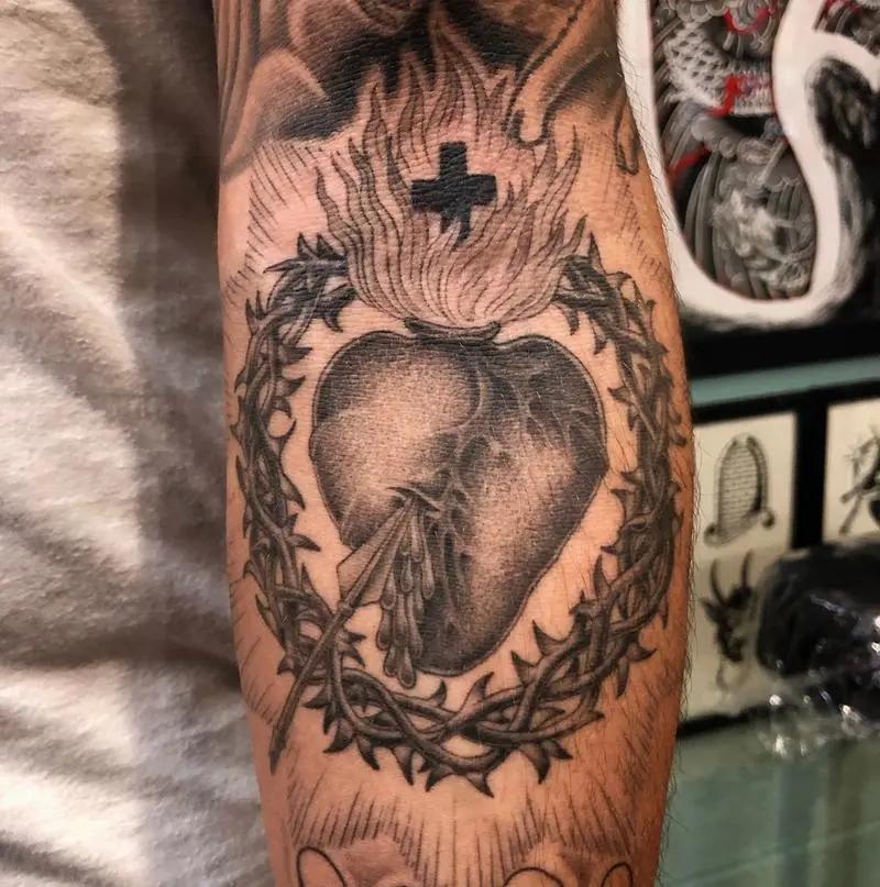 a tattoo of a burning heart 