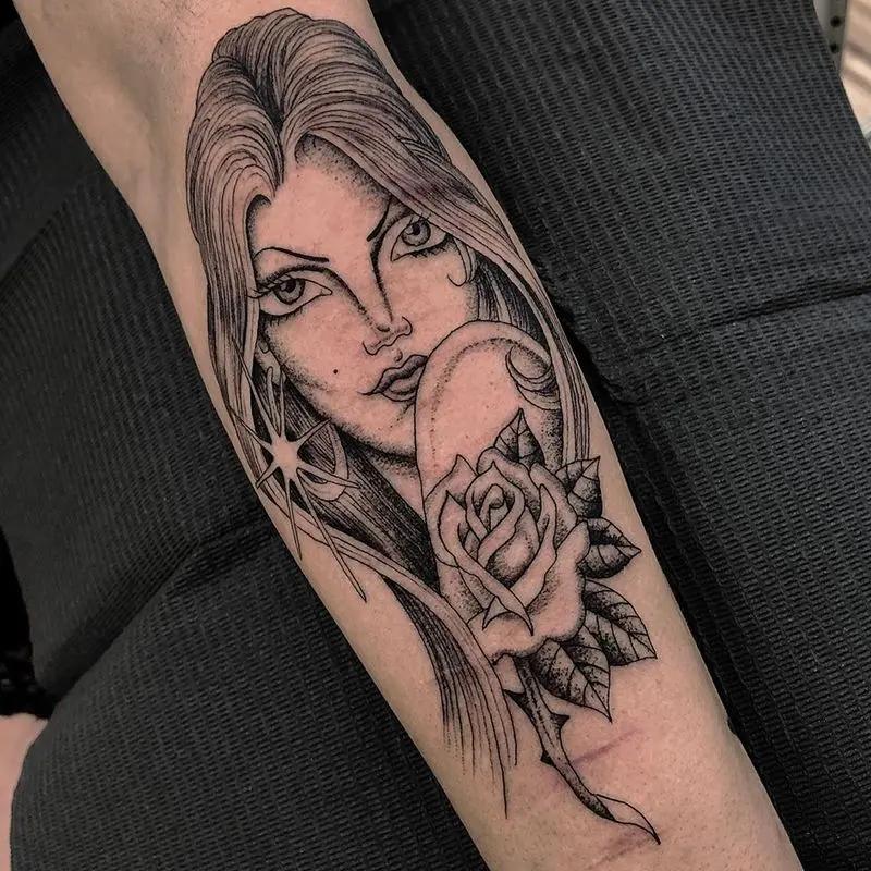 a face of a woman tattoo