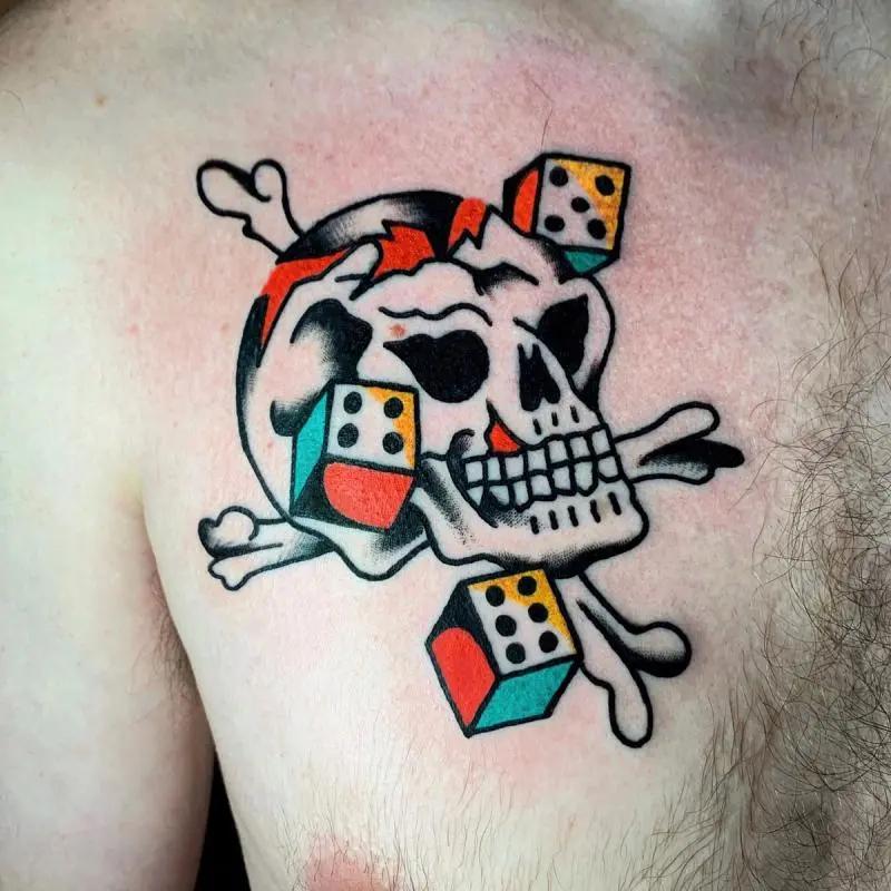 a skull tattoo with dices